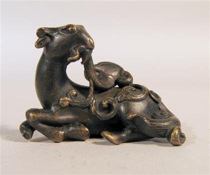 Appraisal: Chinese bronze animal form brush rest late th century Of