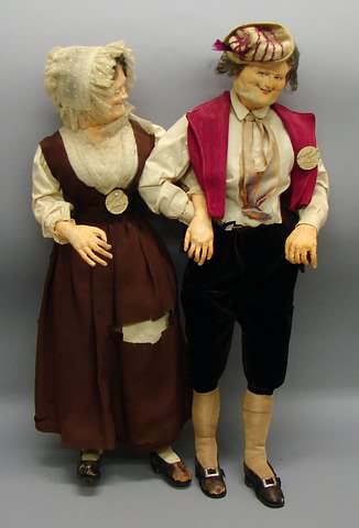 Appraisal: Pair of tagged senior Ravca dolls Female and male Both