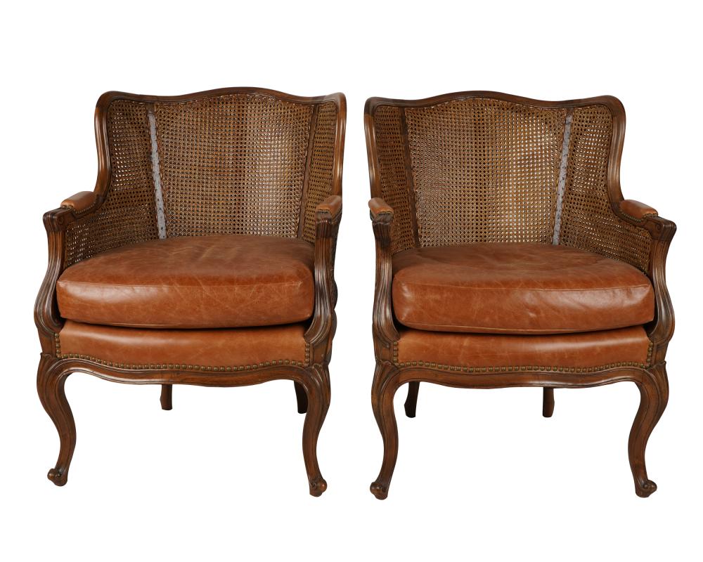 Appraisal: PAIR OF LOUIS XV PROVINCIAL-STYLE CANED BERGERES th century each