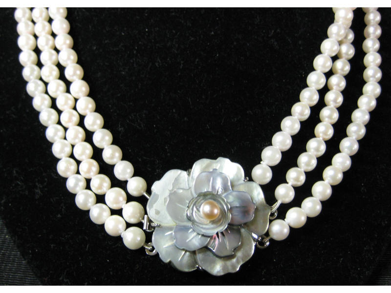 Appraisal: PEARL NECKLACE Triple strand mm pearl necklace set with mother