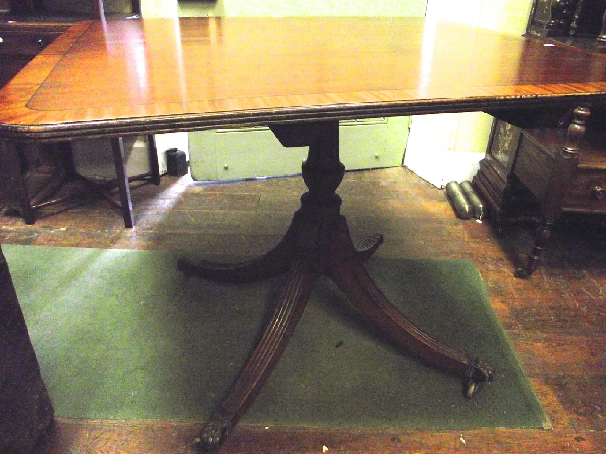 Appraisal: A Regency mahogany breakfast table of square cut form with