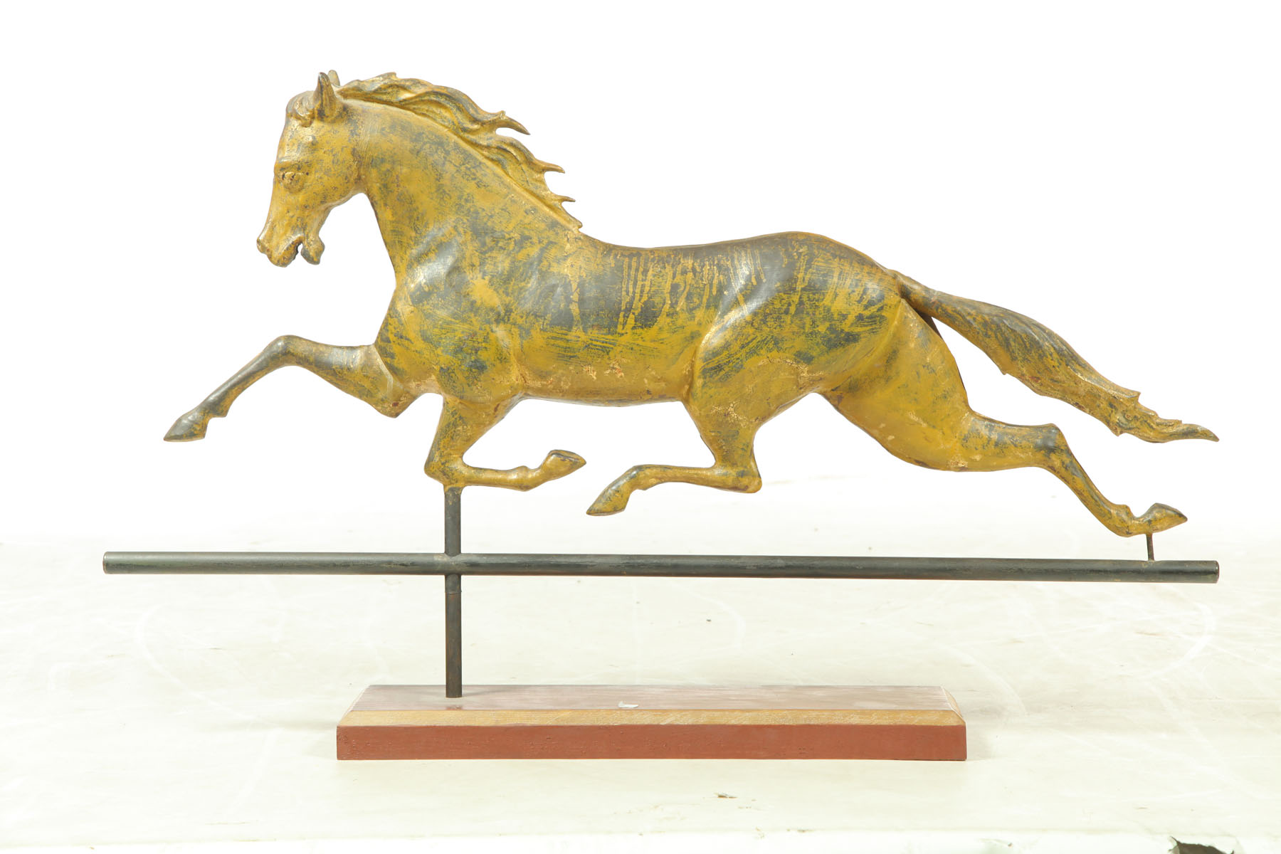 Appraisal: WEATHERVANE American late th century copper Full-bodied running horse with