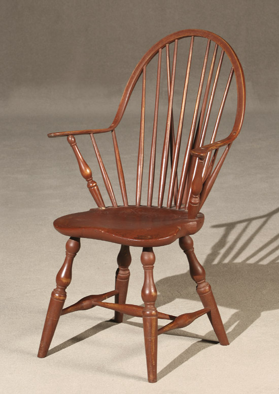 Appraisal: Windsor Red Stained Mixed Wood Continuous Armchair Philadelphia - Red