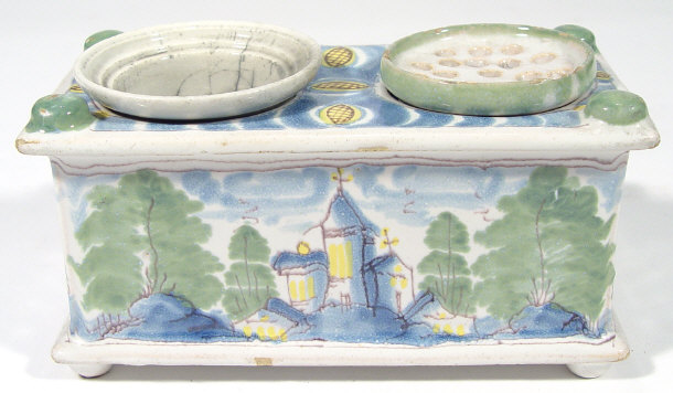 Appraisal: Continental faience glazed pottery desk stand painted with buildings and