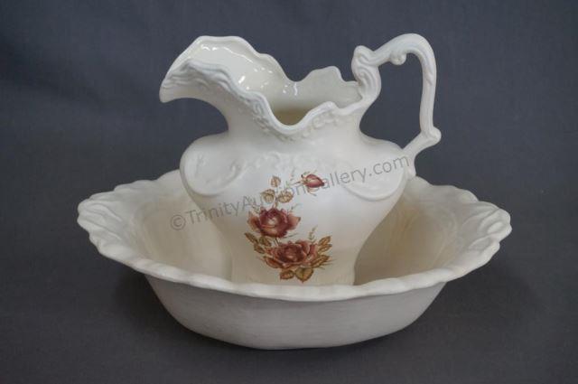 Appraisal: Victorian Style Pitcher and Washbowl Set 's Ceramic set with