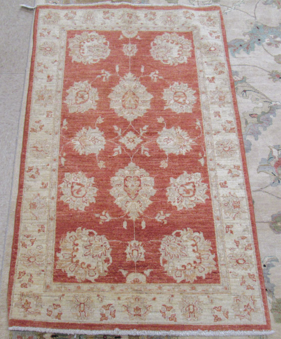 Appraisal: HAND KNOTTED ORIENTAL AREA RUG Pakistani Persian palmette design on