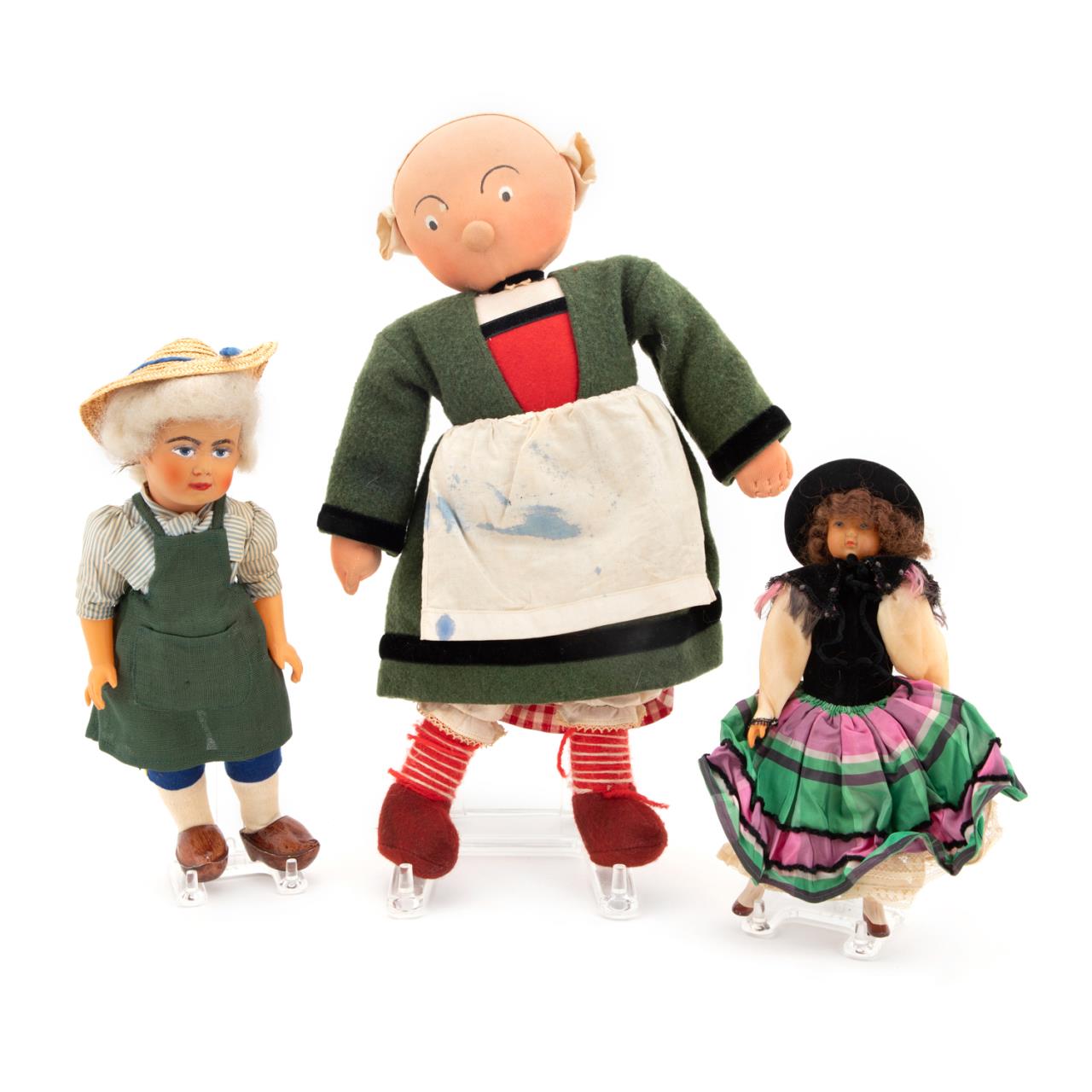 Appraisal: THREE LOUIS VUITTON DOLLS IN REGIONAL DRESS Louis Vuitton circa