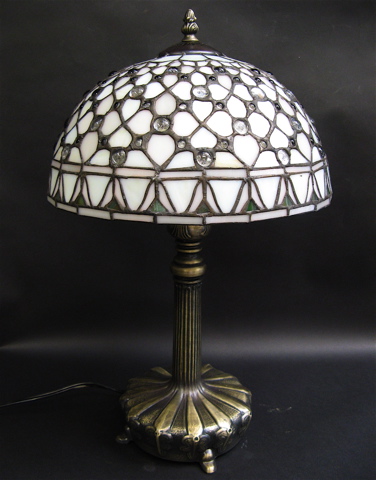 Appraisal: STAINED AND LEADED GLASS TABLE LAMP having variegated white panels