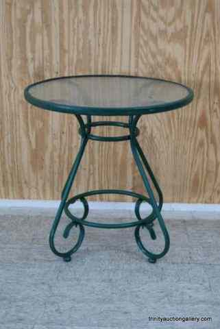 Appraisal: Metal Glass Top Outdoor '' TableFrom the estate is a