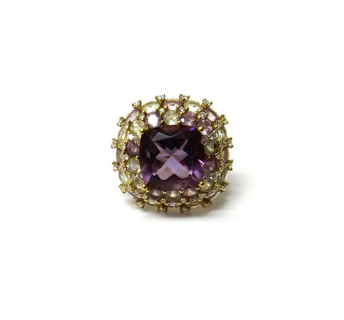 Appraisal: A gold amethyst diamond and vary coloured gemstone set cluster