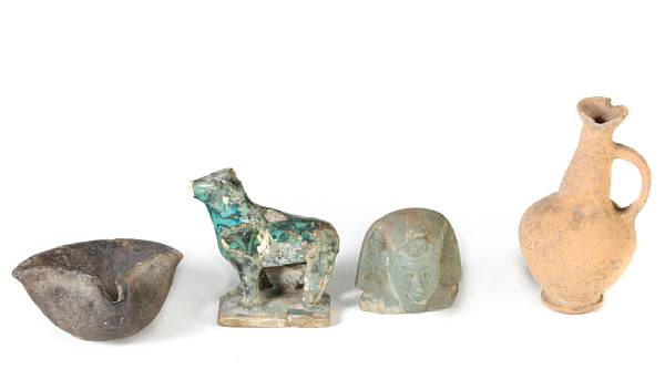 Appraisal: An assembled group of terracotta objects together with four stone