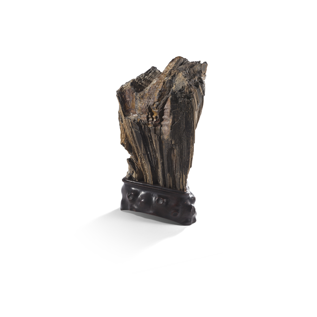 Appraisal: PETRIFIED WOOD SCHOLAR'S ROCK vertically oriented the body expanding outwards