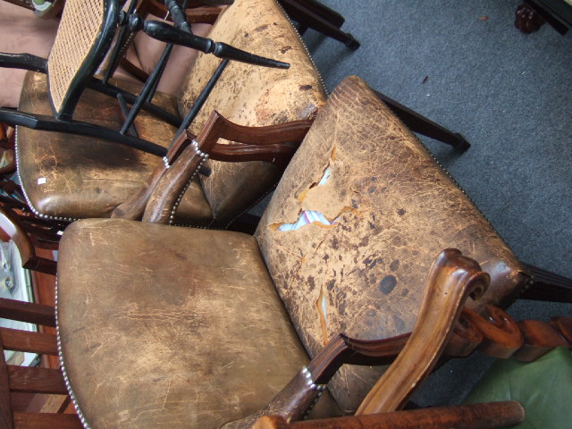 Appraisal: A pair of late th century mahogany open armchairs with