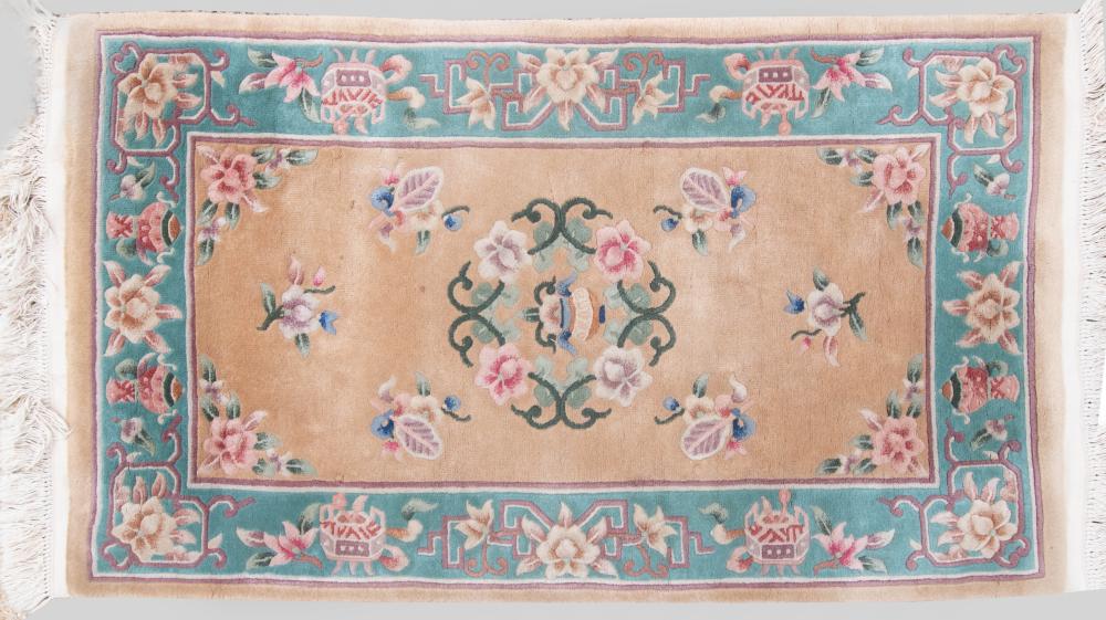 Appraisal: SMALL INDIAN WOOL RUG woven in a Chinese floral pattern