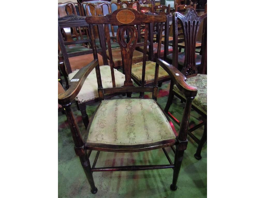 Appraisal: An Edwardian lightweight stained beechwood open elbow chair the raised