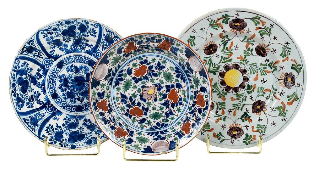 Appraisal: Three Small English and Dutch Delftware Plates th century one