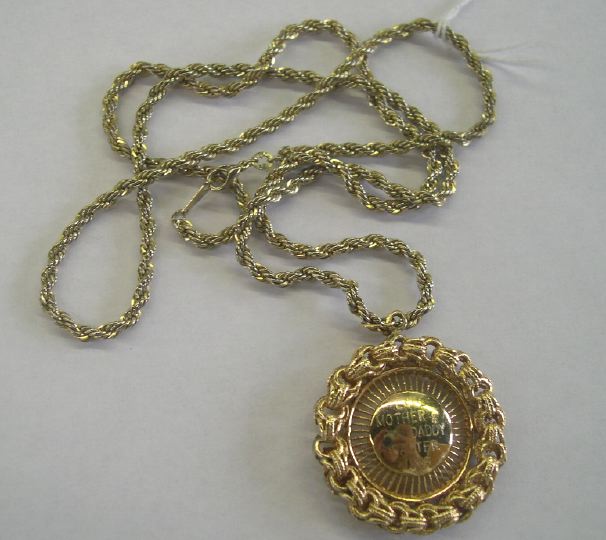 Appraisal: Circular Fourteen-Karat Yellow Gold Filigree Locket suspended from a gold