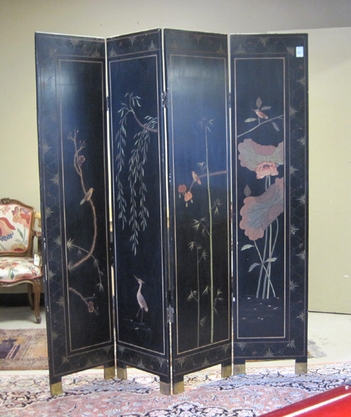 Appraisal: CHINESE FOUR-PANEL COROMANDEL FLOOR SCREEN a black lacquer screen decorated