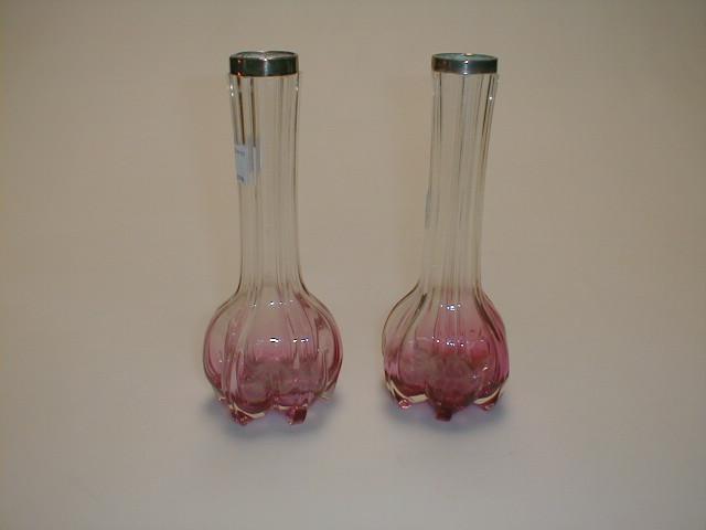 Appraisal: A pair of early thC pink tinted glass specimen vases