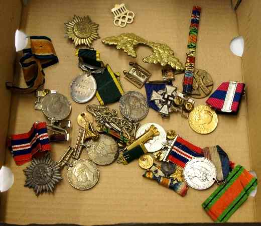 Appraisal: A Box of Mixed German and British Medals and Badges