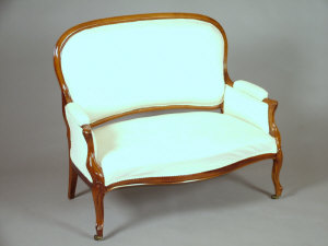 Appraisal: A French mahogany double settee circa with pale upholstery upon