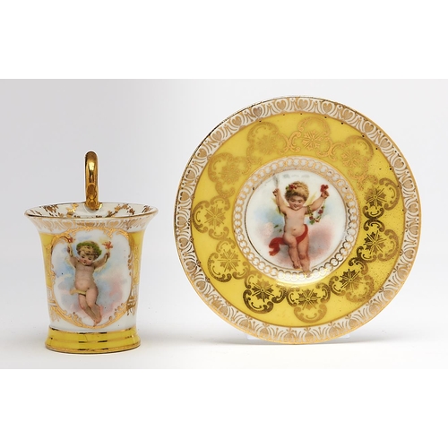 Appraisal: A Vienna style yellow ground miniature cabinet cup and saucer