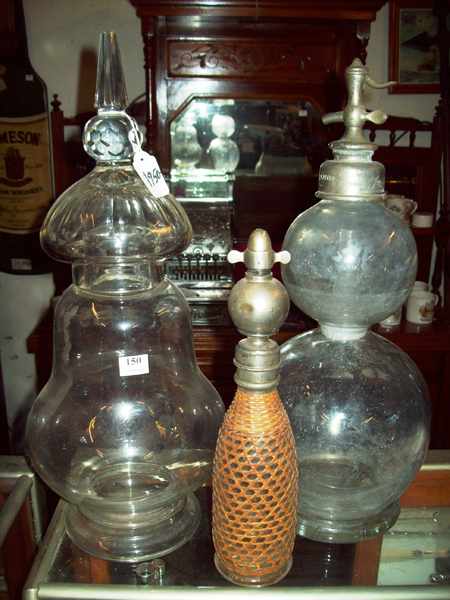 Appraisal: A LATE VICTORIAN CARBOY WITH LID AND TWO SODA SIPHONS