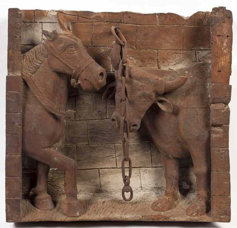 Appraisal: Spanish Carved Fruitwood Panelcirca th century horse and cow motif