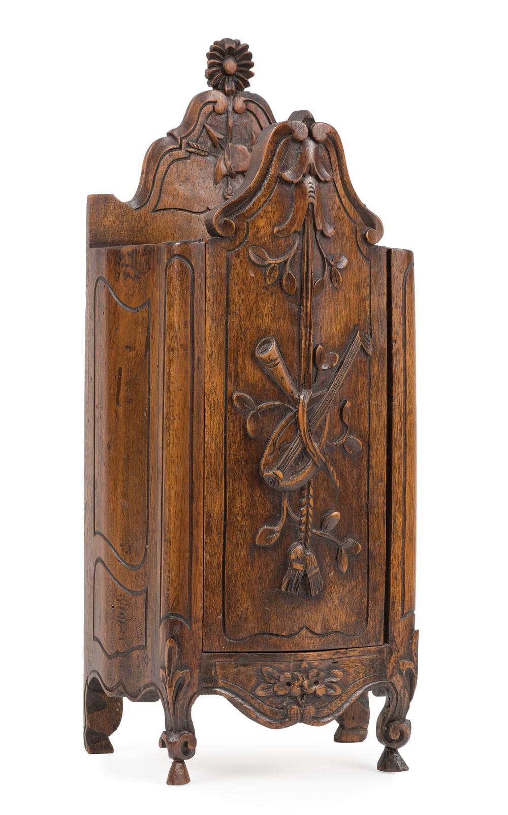 Appraisal: French Provincial Carved Walnut Candlebox sliding cover with relief of