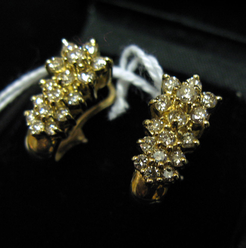 Appraisal: PAIR OF DIAMOND AND FOURTEEN KARAT GOLD CLUSTER EARRINGS each