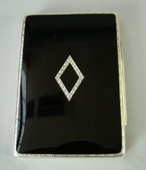 Appraisal: An Art Deco silver and enamel card case with all