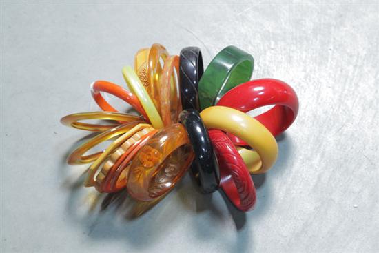 Appraisal: EIGHTEEN BAKELITE BRACELETS All bangles some with carving various colors