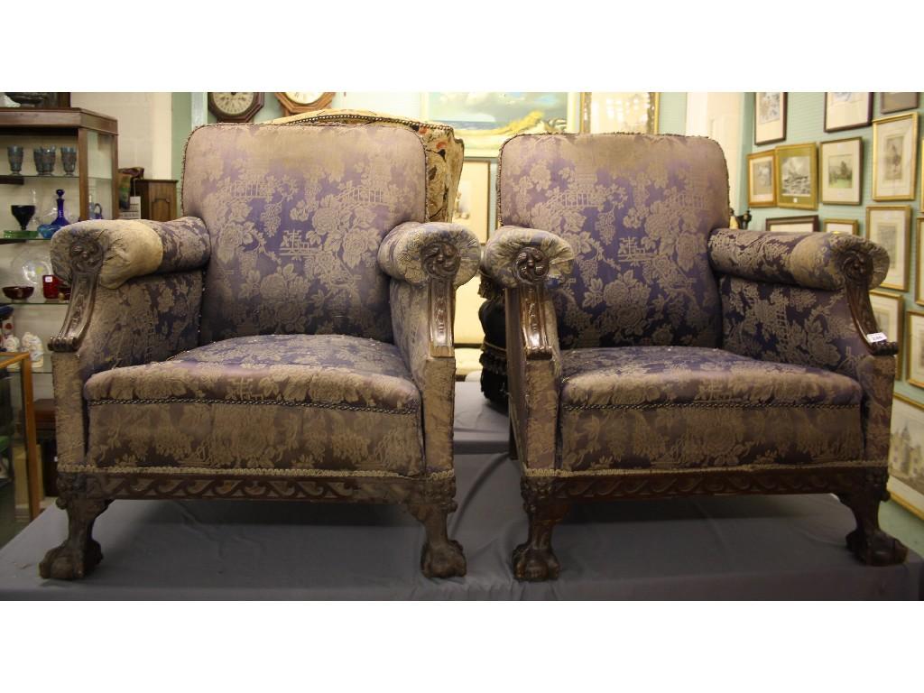 Appraisal: Pair of Georgian style lounge chairs with blue floral upholstery