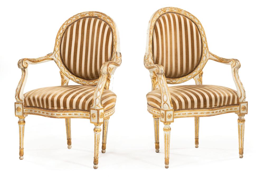 Appraisal: Pair of Italian Creme Peinte and Giltwood Fauteuils late th