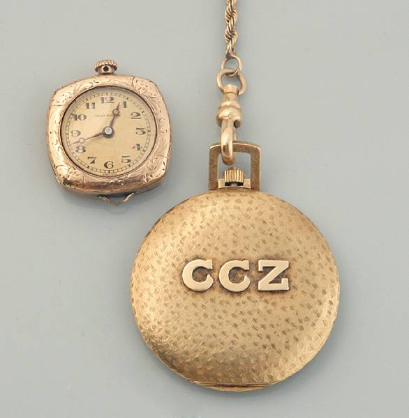 Appraisal: A gold pocket watch with chain and a small gold-filled