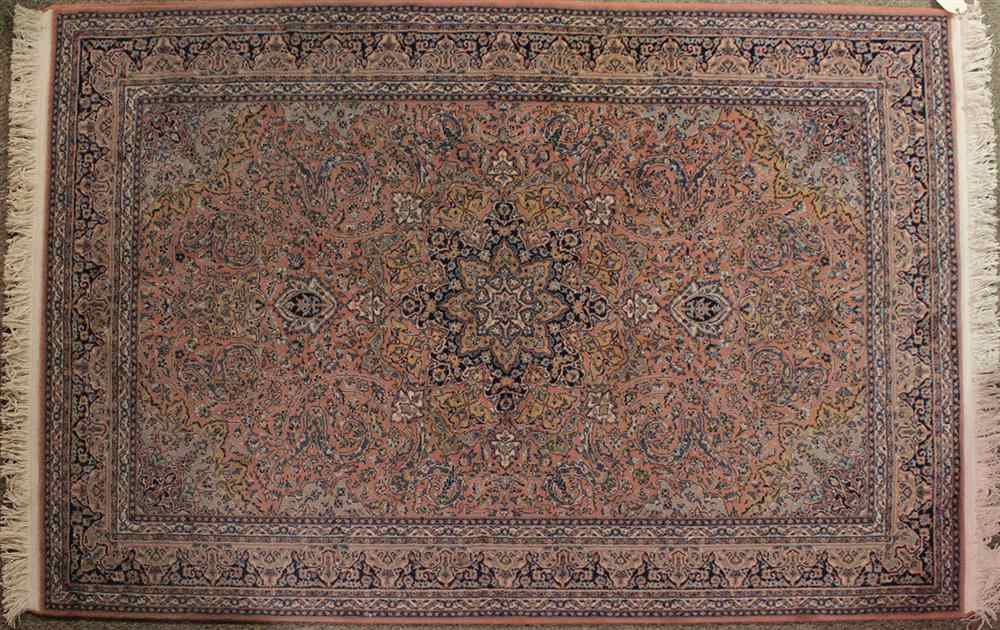 Appraisal: TURKISH WOOL ORIENTAL RUG in pink blue navy tan and