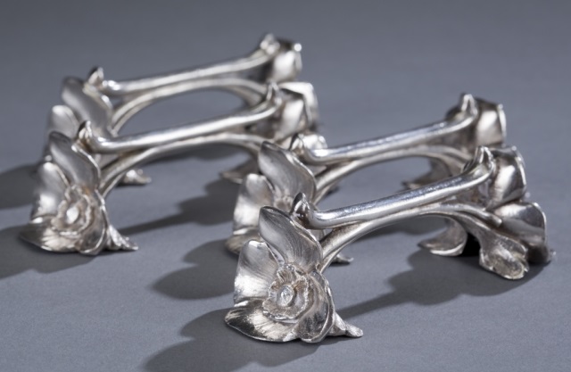 Appraisal: Four Christofle Art Deco Gallia Knife Rests Four floral form