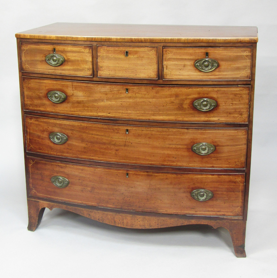 Appraisal: A George III mahogany and boxwood inlaid bow front chest