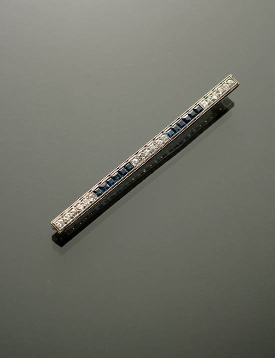 Appraisal: Art Deco Platinum Diamond and Blue Sapphire Bar Pin Circa