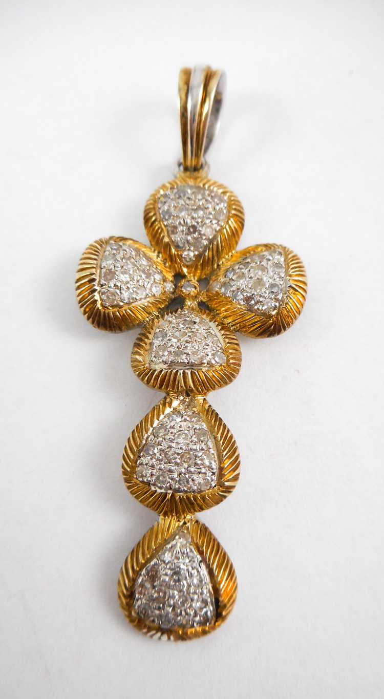 Appraisal: DIAMOND AND SILVER CROSS PENDANT The gold tone silver cross