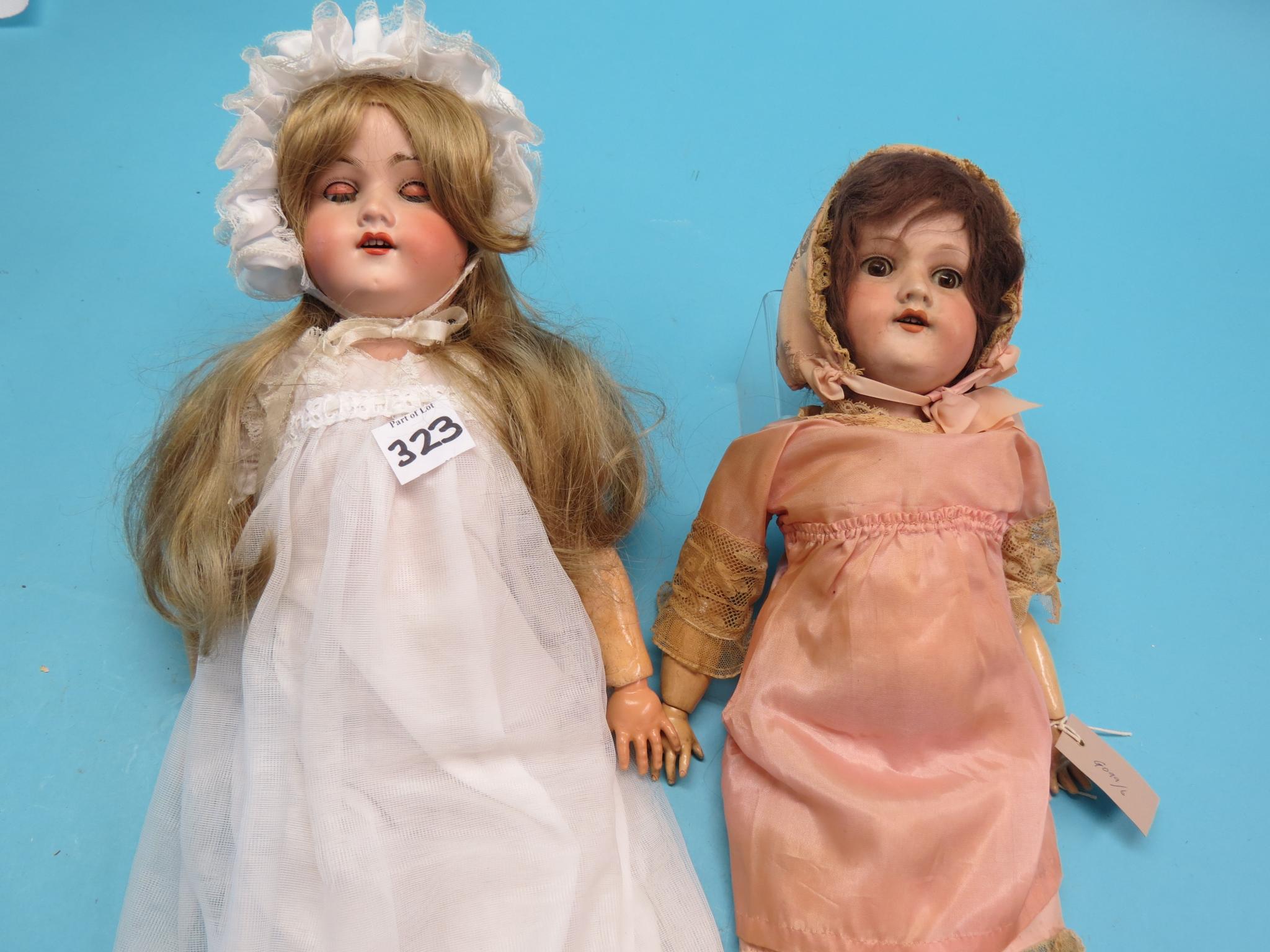 Appraisal: Two Armand Marseille bisque dolls each mould jointed wood and