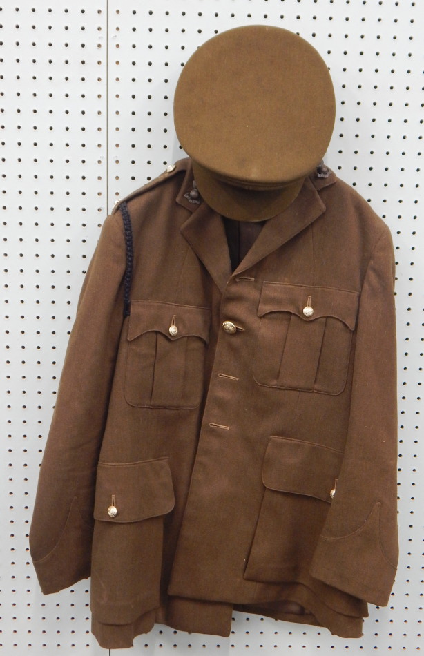 Appraisal: A Royal Engineers uniform hat and a military issue gas