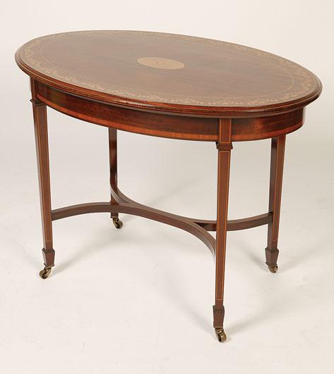 Appraisal: AN EDWARDIAN MAHOGANY AND MARQUETRY OVAL TOPPED OCCASIONAL TABLE the