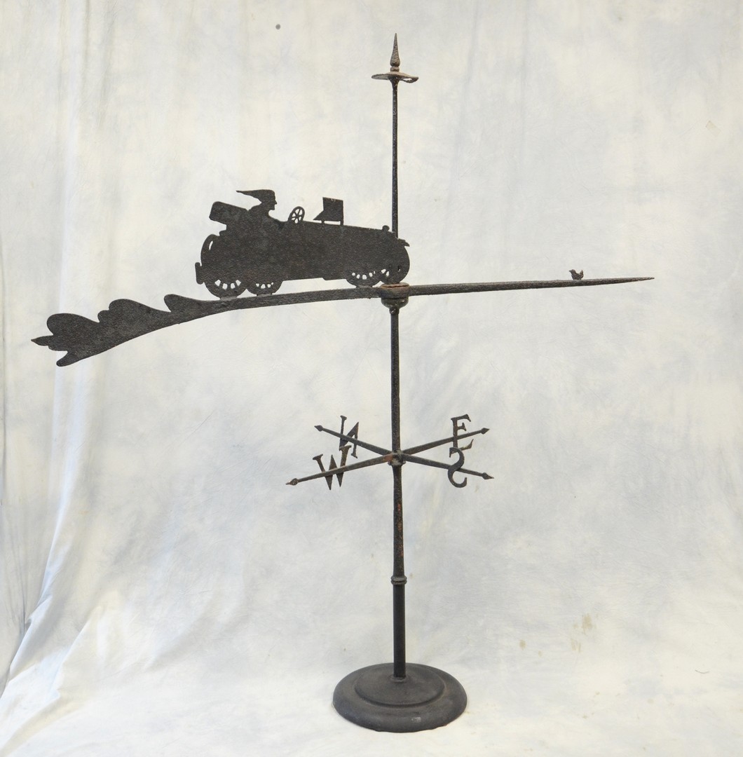 Appraisal: Hand forged iron weathervane woman in roadster and chicken in