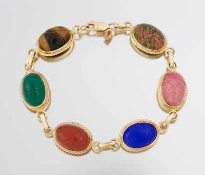 Appraisal: A Carved Scarab Gemstone Bracelet k yellow gold bracelet set