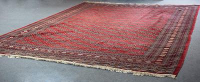 Appraisal: A Bokhara carpet Turkmenistan late th Century the madder field