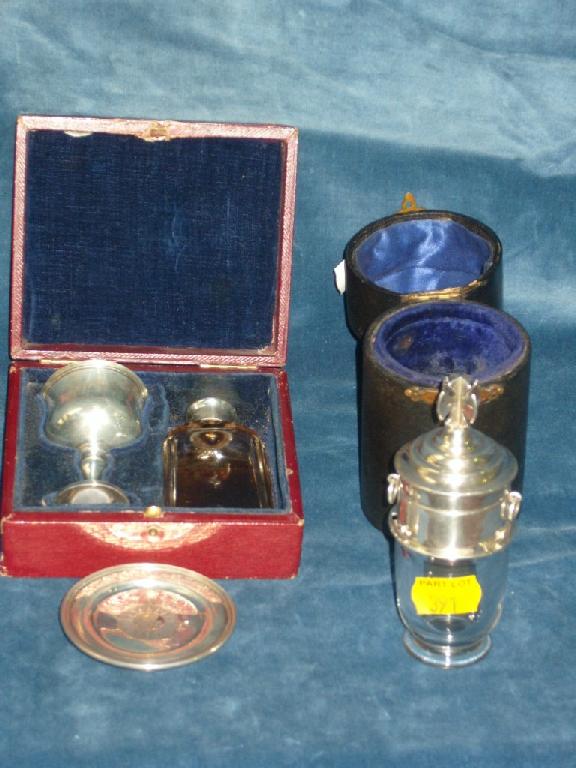 Appraisal: A silver -piece communion set in red leather travelling case