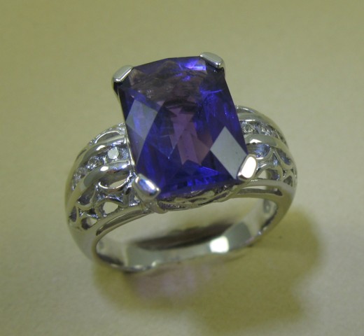 Appraisal: AMETHYST AND DIAMOND RING k white gold and centering a