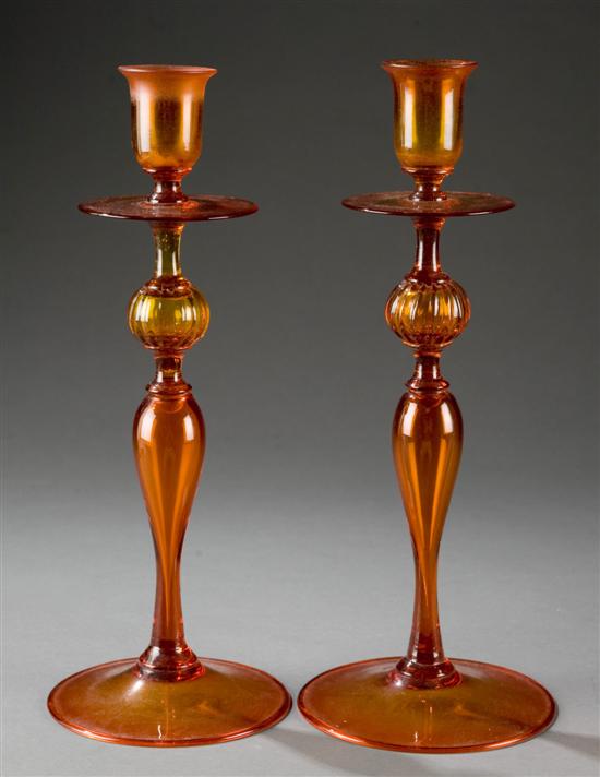 Appraisal: Pair of Steuben orange glass candleholders Art nouveaux hand-blown candlesticks