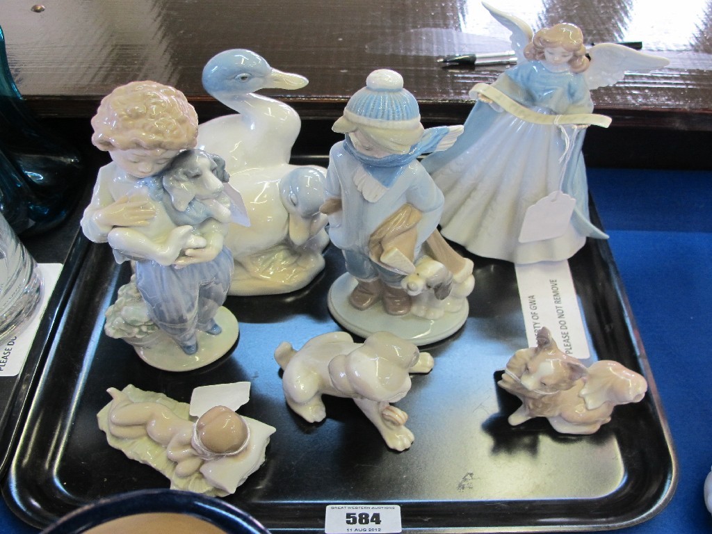 Appraisal: Five Lladro figures and two others to include Papillon dog